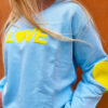 blue sweat shirt